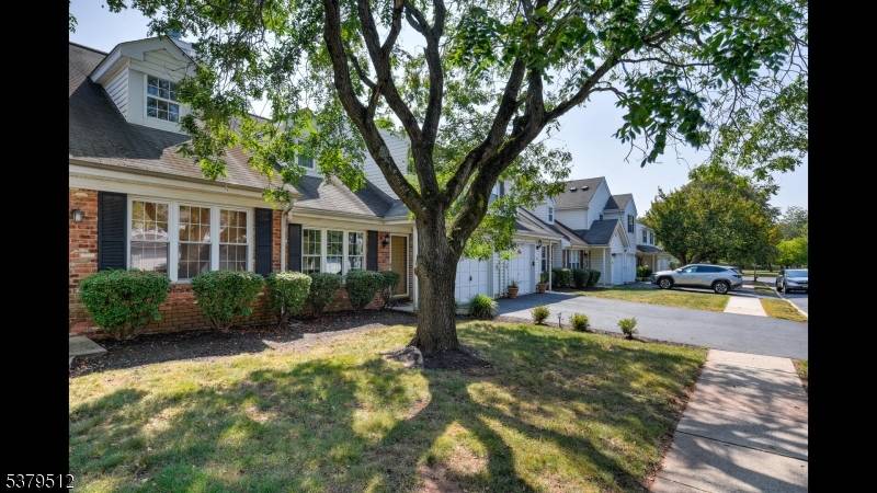 This bright and beautifully updated home offers a spacious open floor plan with soaring ceilings and a cozy wood burning fireplace ?
