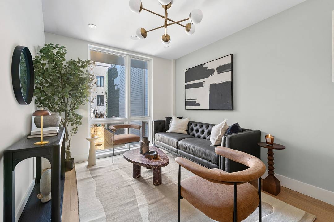 Welcome to The Ridge at 1811 Menahan Street a newly built, six residence boutique condominium tucked along a quiet, tree lined block in the heart of Ridgewood.