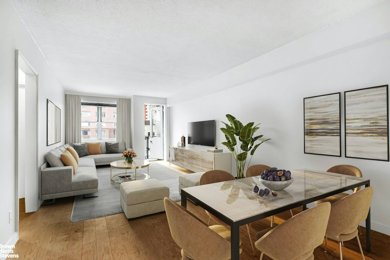 Spacious condo with true windowed bedroom and balcony overlooking Chelsea roofs.