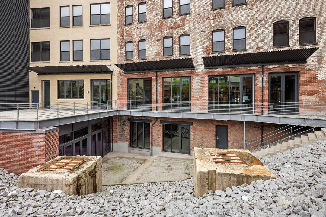 UNCOVER THE MALT HOUSE SANCTUARY A LOWER LEVEL MASTERPIECE This is a rare discovery a lower level space in the heart of the Factory District that defies convention.