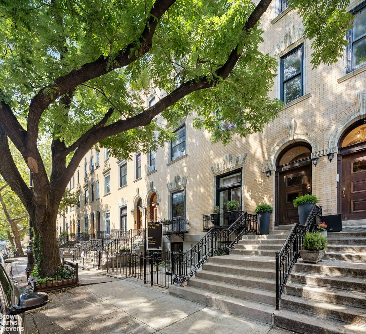 Experience the epitome of luxury living in this meticulously renovated home, situated on a picturesque tree lined street in the coveted Strivers' Row Historic District.