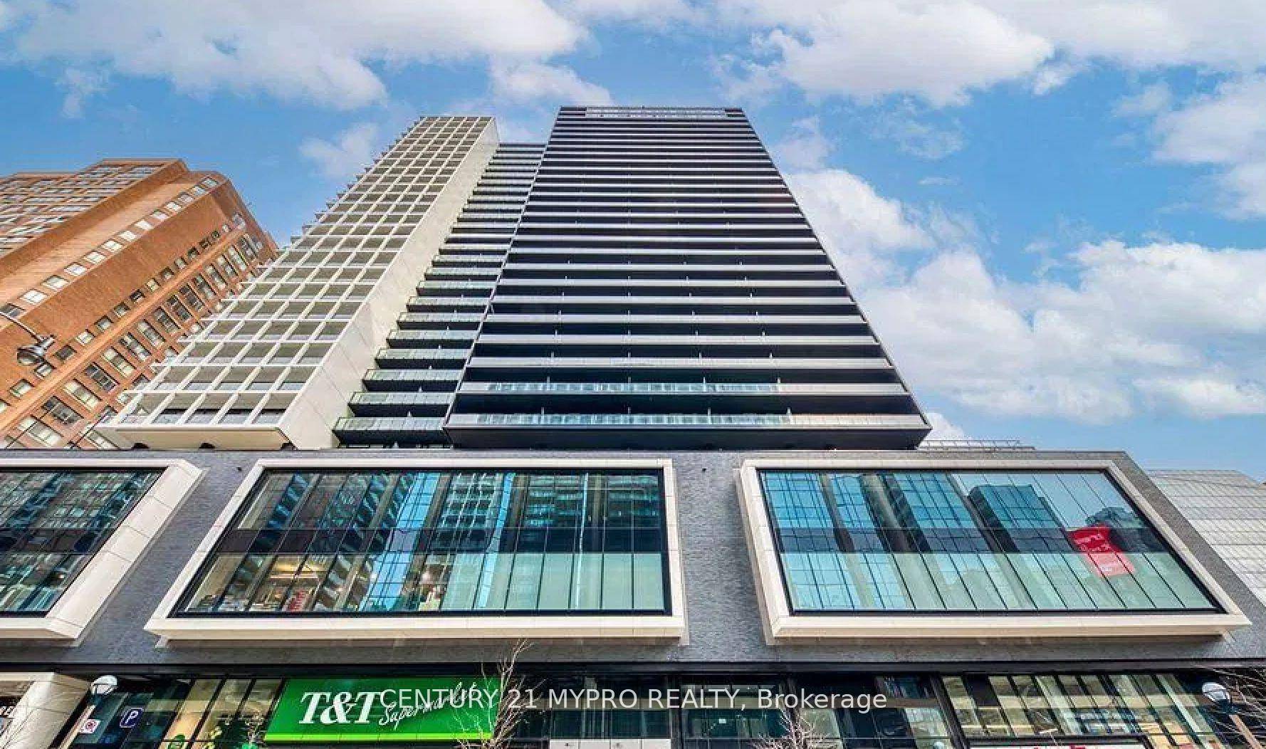 Partial Furnished 2 Bedroom Unit including bed in each room and desk in the smaller room.