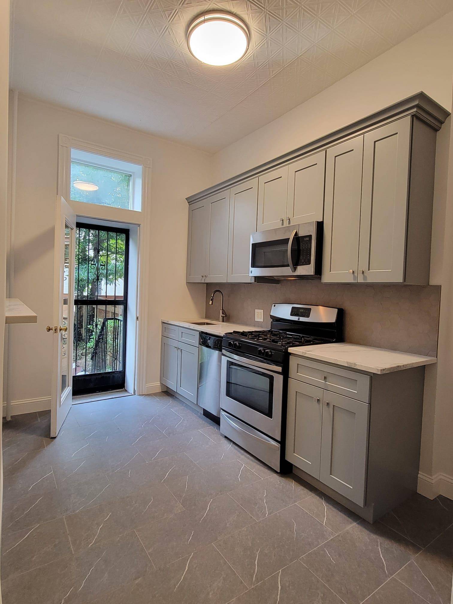 This large two bedroom apartment has high ceilings, brand new hardwood floors newly installed throughout, new kitchen cabinets and counter tops, newly installed ceramic tile kitchen floors, stainless steel appliances ...