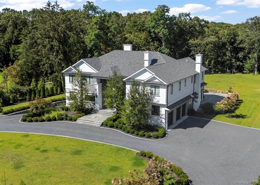 Welcome to 5 Gerry Lane, an extraordinary new construction in the prestigious Village of Lloyd Harbor.