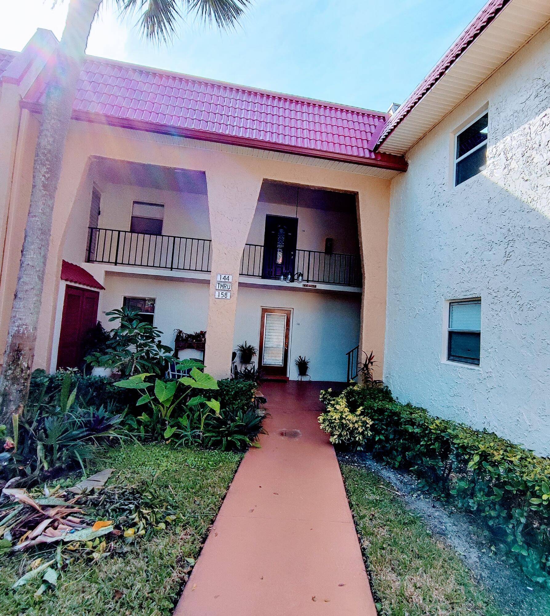 Experience tranquility and luxury in this 1 bed, 1 bath corner unit at 150 Lake Evelyn Dr, West Palm Beach, FL 33411.