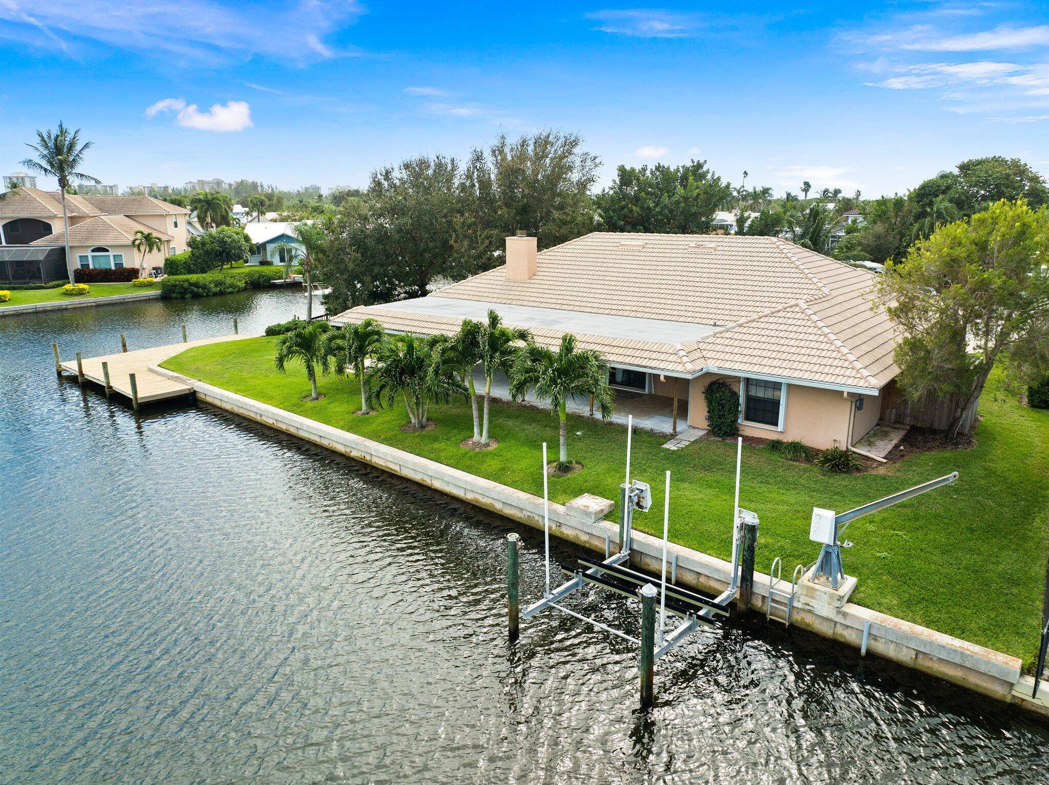 Discover the ultimate waterfront lifestyle with this stunning 3 Bedroom, 2 Bathroom, furnished seasonal rental in Queen's Cove on North Hutchinson Island.