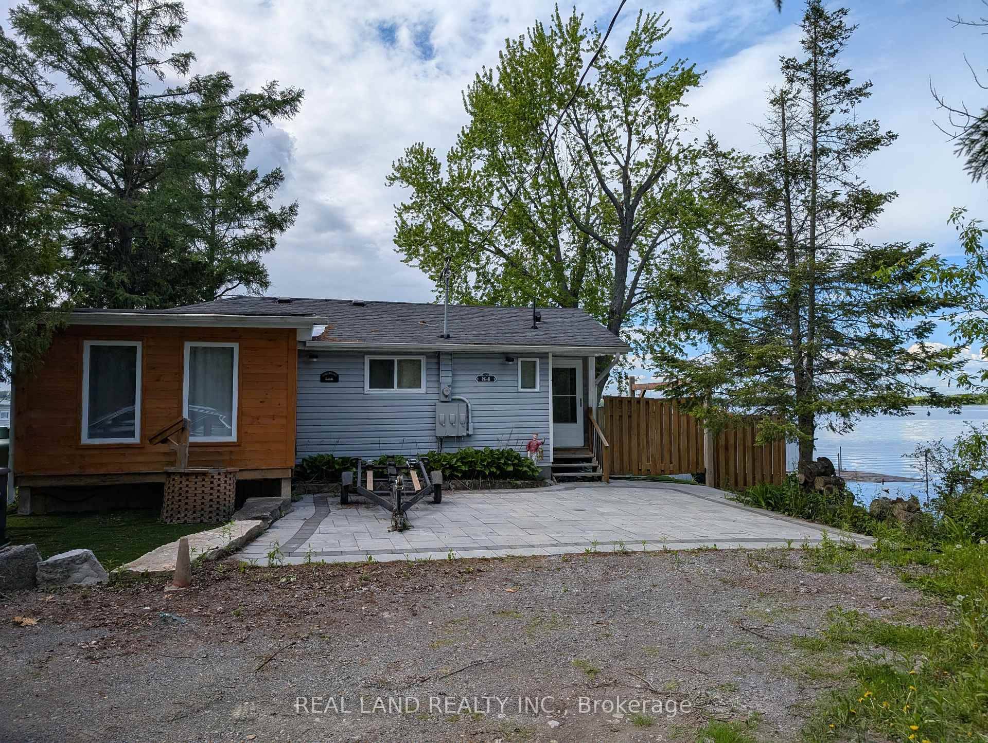 Beautiful four seasons cottage with spectacular views amp ; glorious sunsets on Rice Lake with a wonderful corner Lot wide exposure and excellent Shoreline.