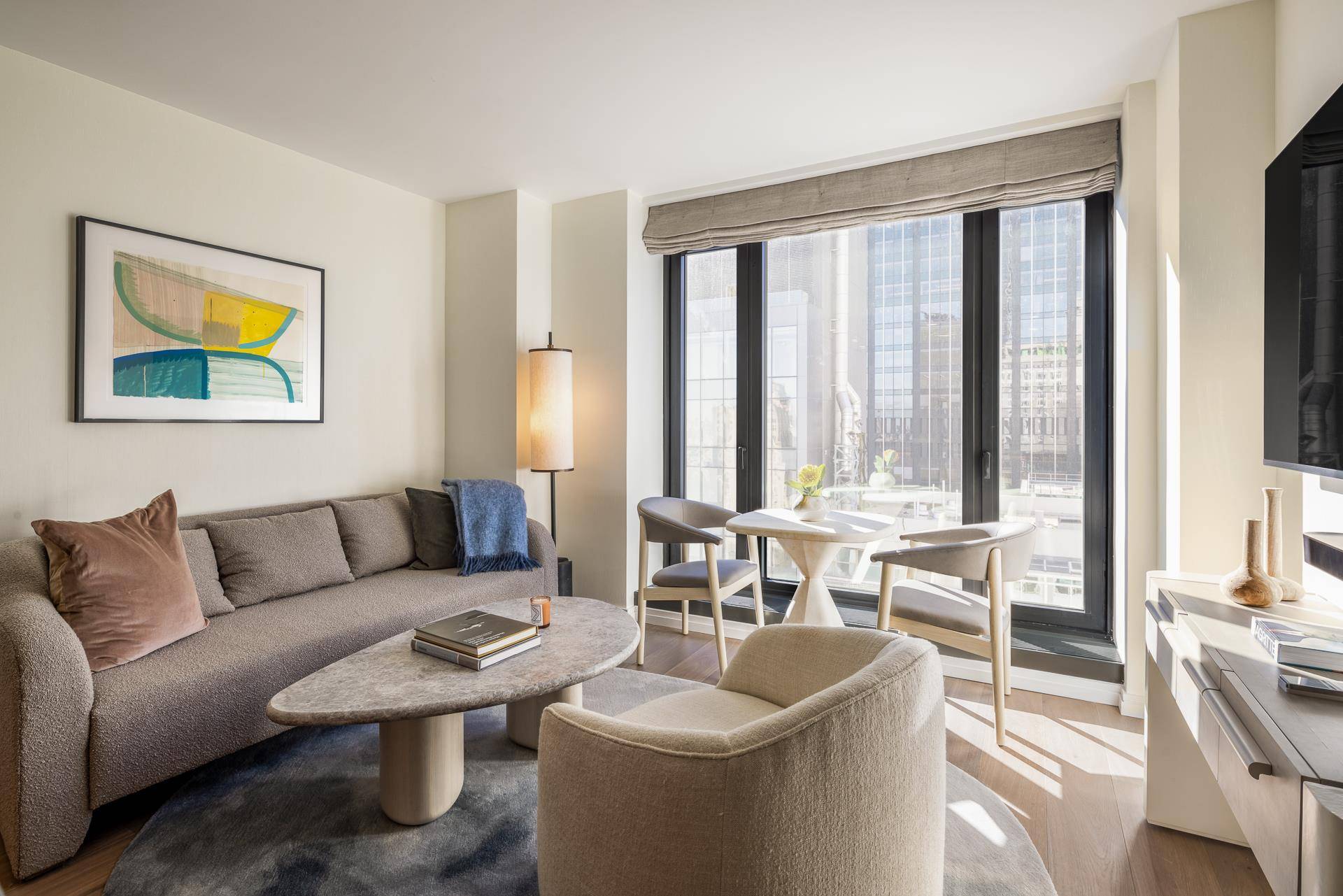 Immediate Occupancy This warm and cozy, 550 square foot, one bedroom, one bathroom residence designed by Thomas Juul Hansen, features an open living concept with floor to ceiling windows.