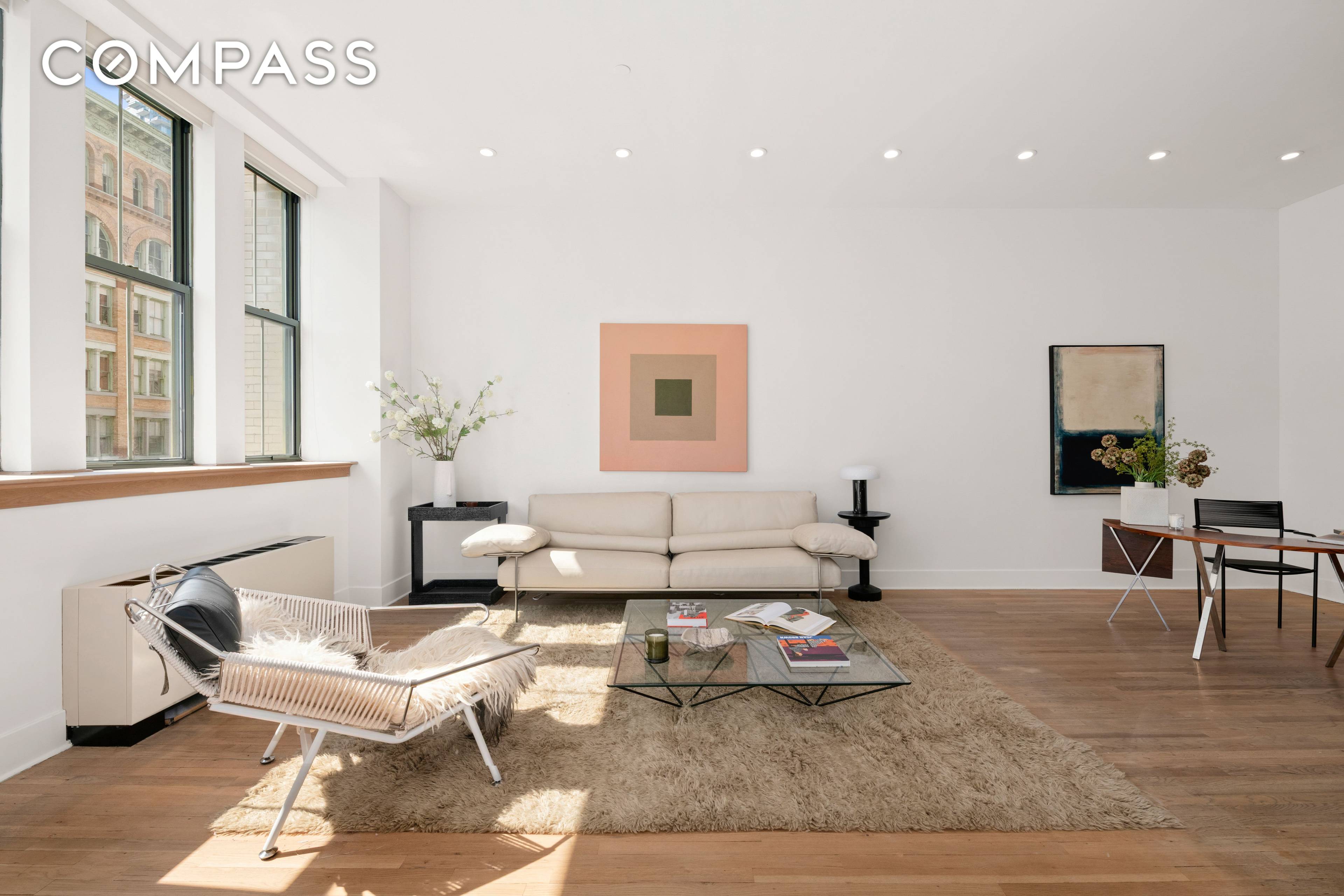 This is a graciously proportioned 2, 450 square foot 3 bedroom, 2 bath loft with 10 8 ceilings and over sized windows.