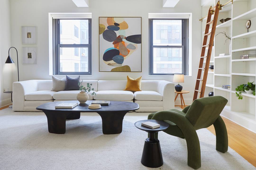 Experience contemporary elegance in this 1703 square foot BellTel Loft situated within the 1929 Landmarked Art Deco Building at 365 Bridge Street.