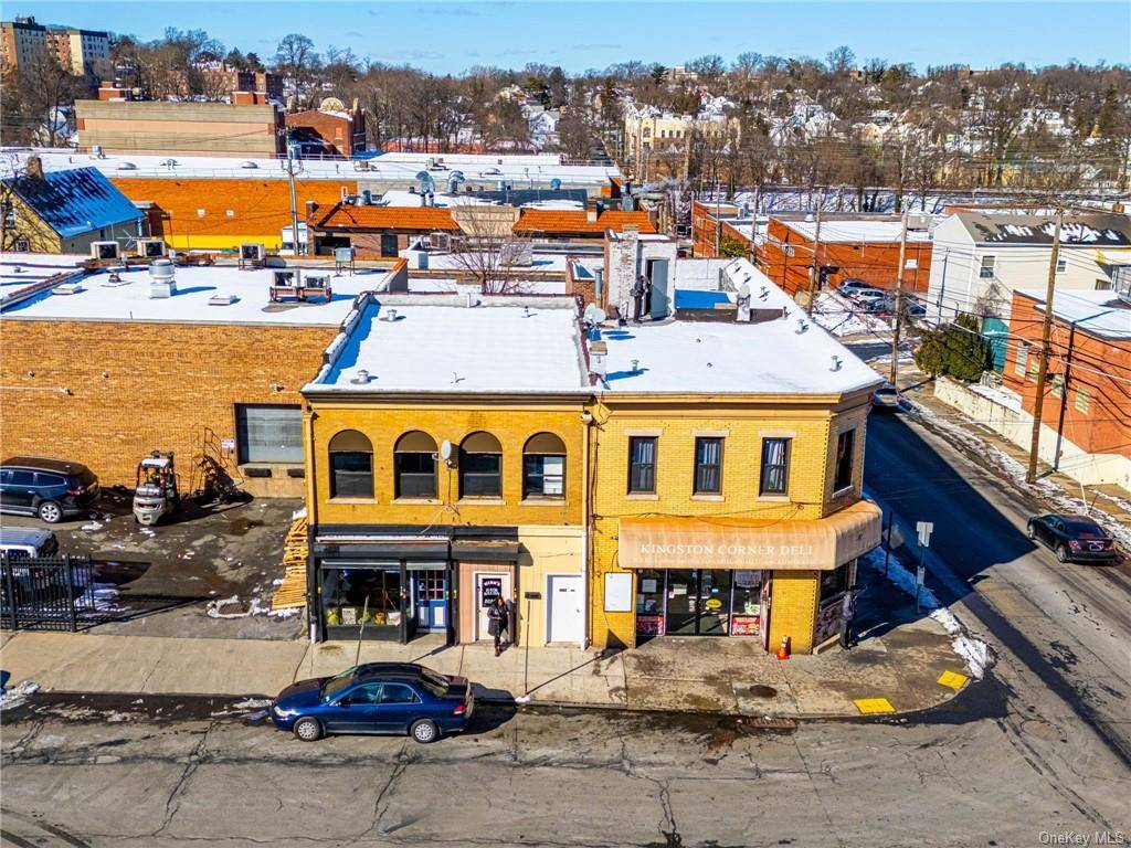 10, 000 sq. ft. 2 story brick corner mixed use property located at East 3rd St.
