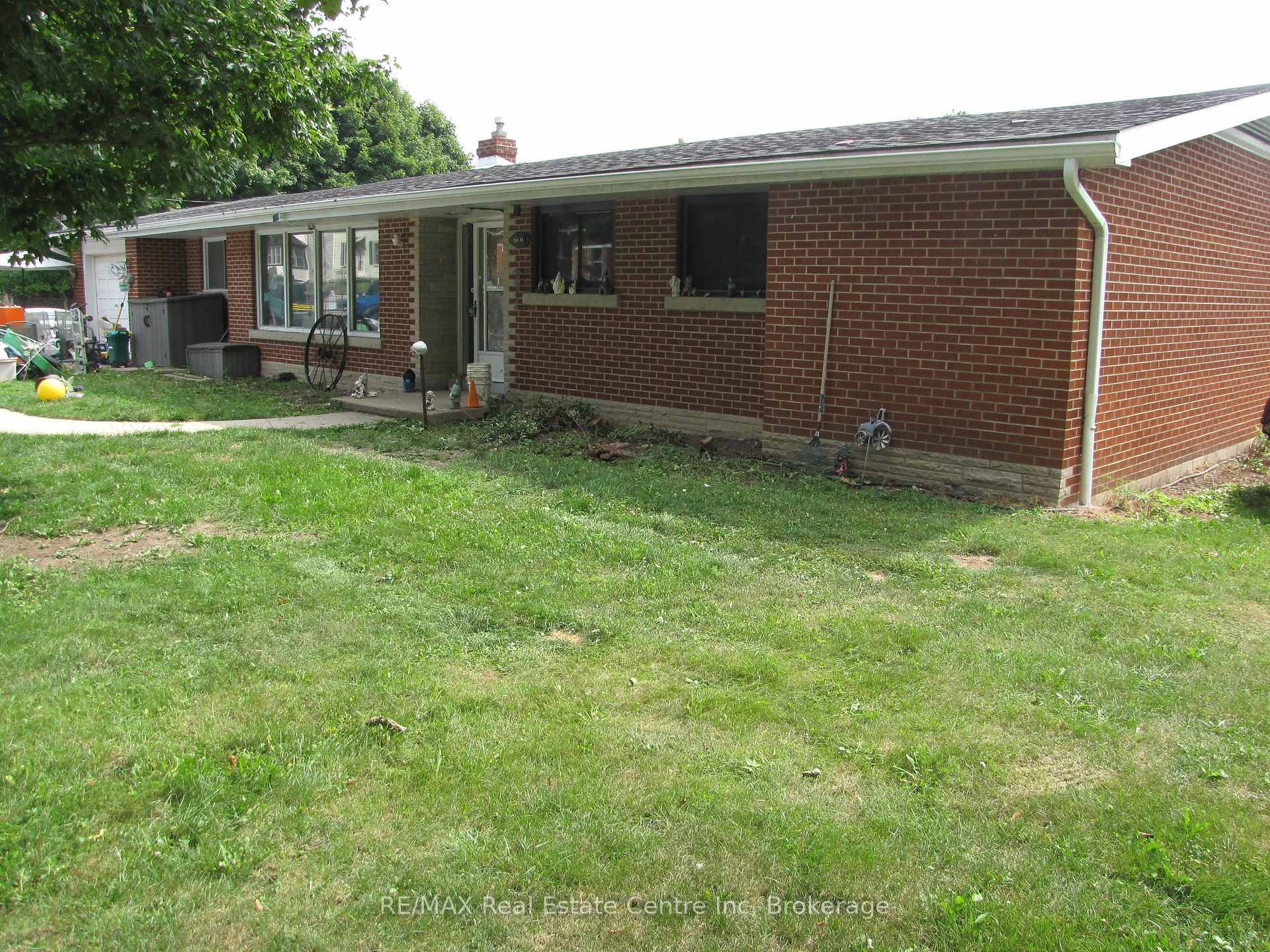 GREAT BONES ! Put your imagination into this super spacious, solid brick bungalow and make it your own !
