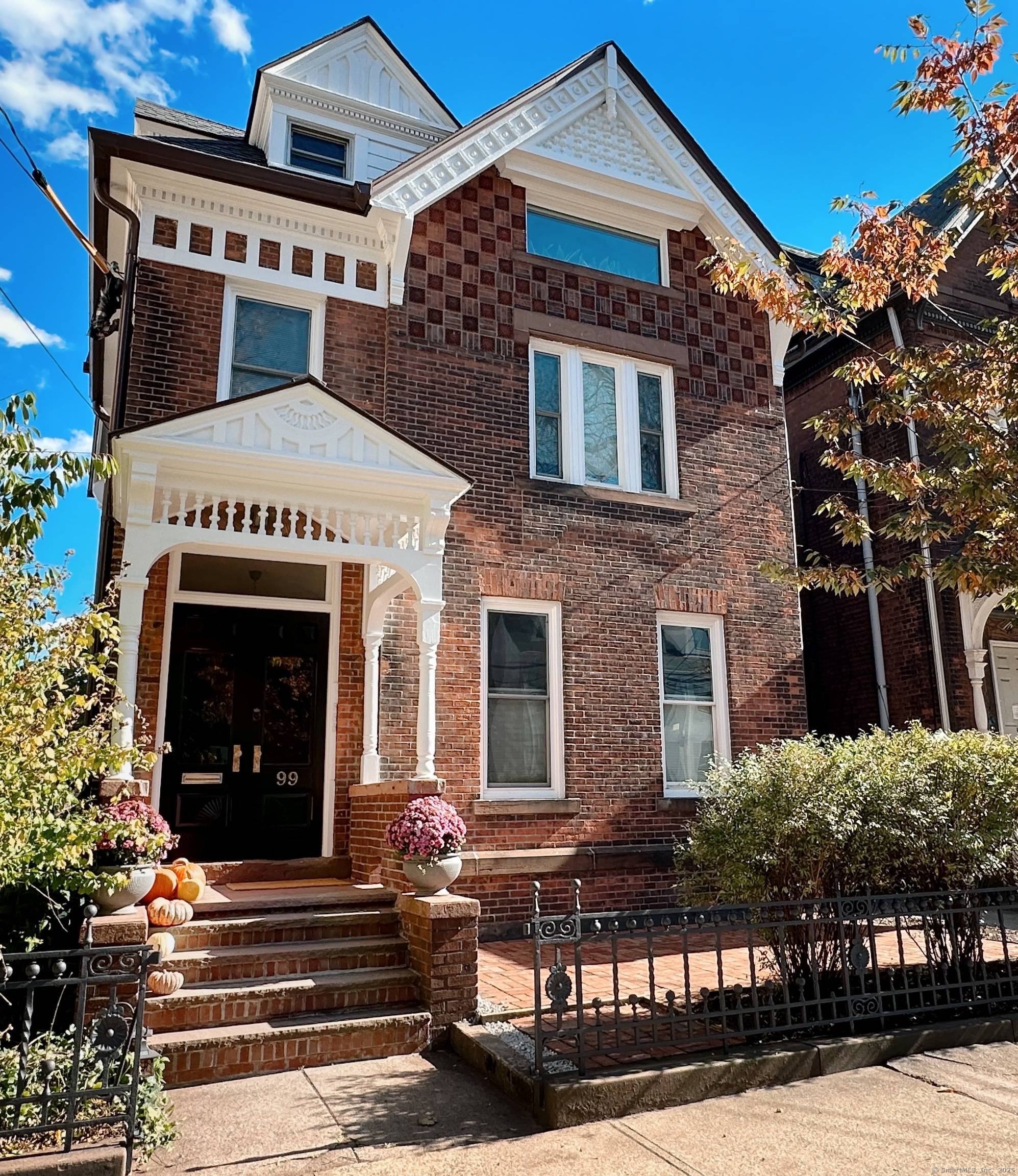 Step into timeless elegance at 99 Olive Street, a rare Queen Anne Victorian style three family in the heart of Wooster Square !