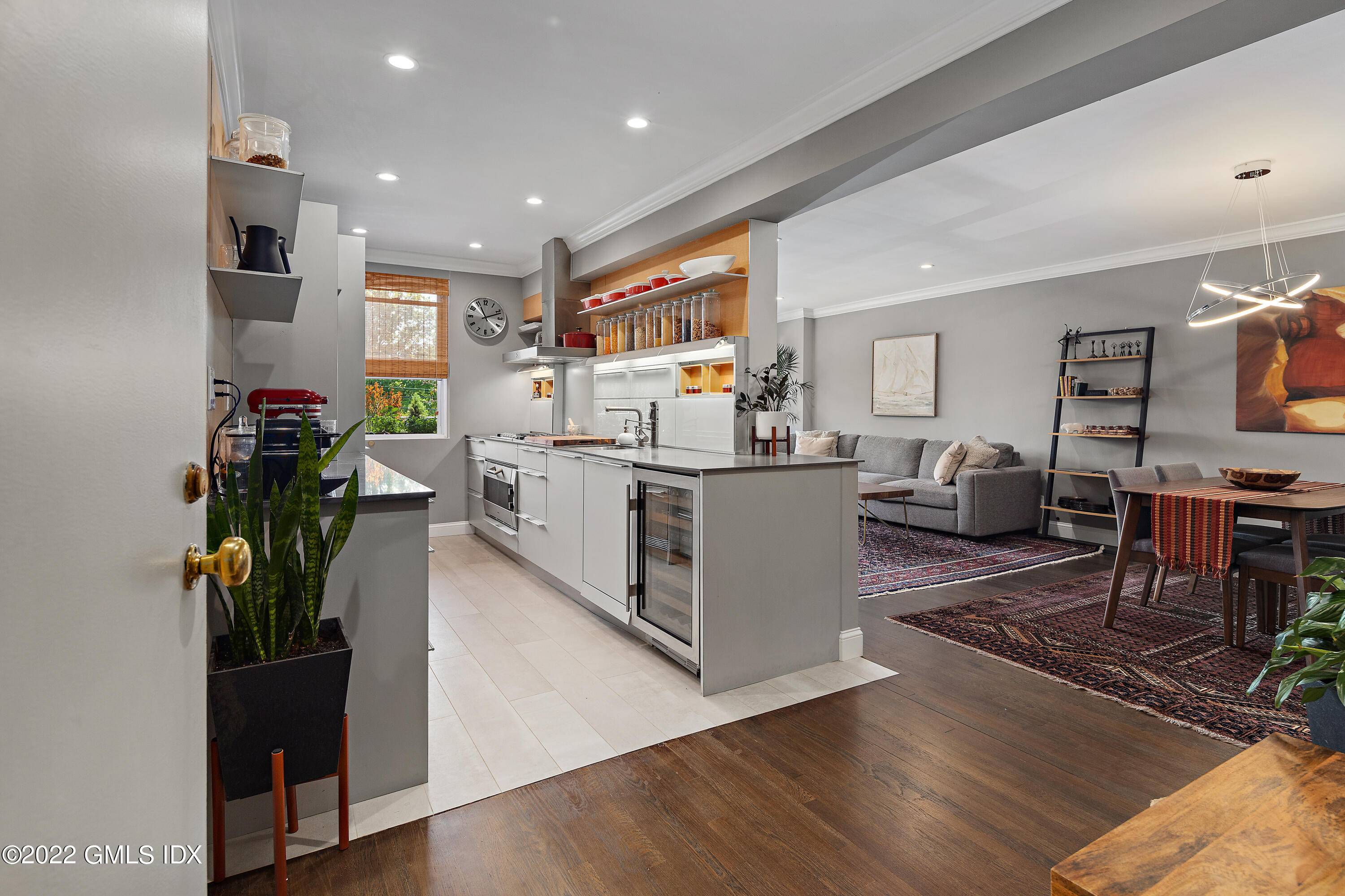 Convenience sophisticated style is what you get with this luxury 2BR ranch style unit set back in its own quiet enclave in the heart of town.