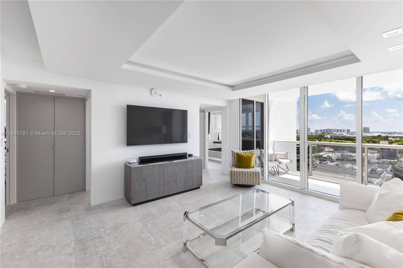 Fully remodeled, no expense spared this 2 2 turnkey corner unit at 1800 Sunset Harbour 1515 offers sweeping ocean amp ; bay views.