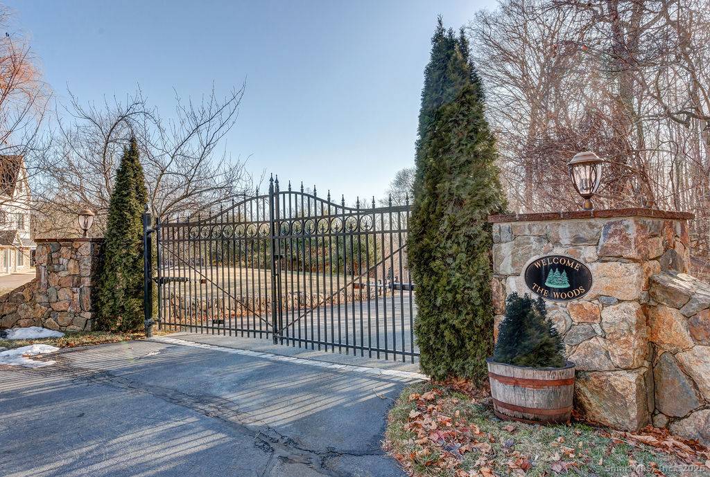 5 Luxury Townhouse Condominiums, NESTLED PRIVATELY BEHIND 2614 BOSTON POST ROAD and a short drive to Guilford's Town Center, the Cottage at the Woods transports you to a quaint European ...