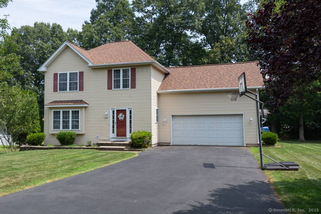 Step right in and fall in love with this sunny Colonial set on a beautiful lot on a cul de sac !