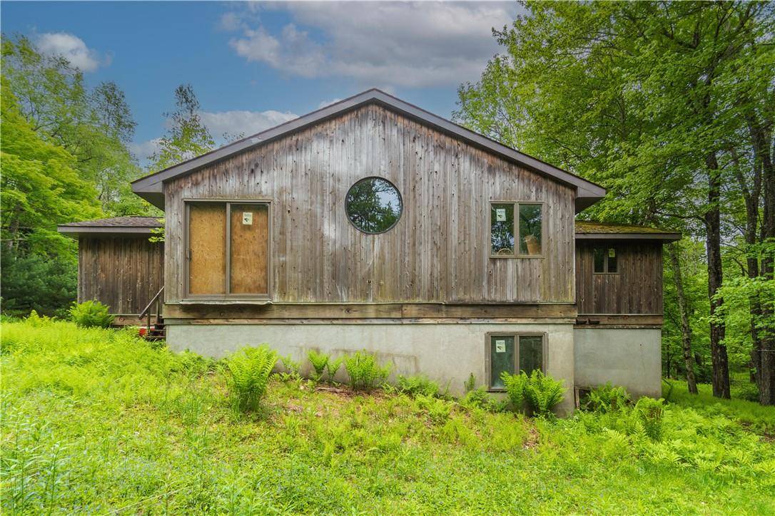 Imagine owning 63 acres of pristine land, complete with a serene pond, framed out home, with well and septic system.