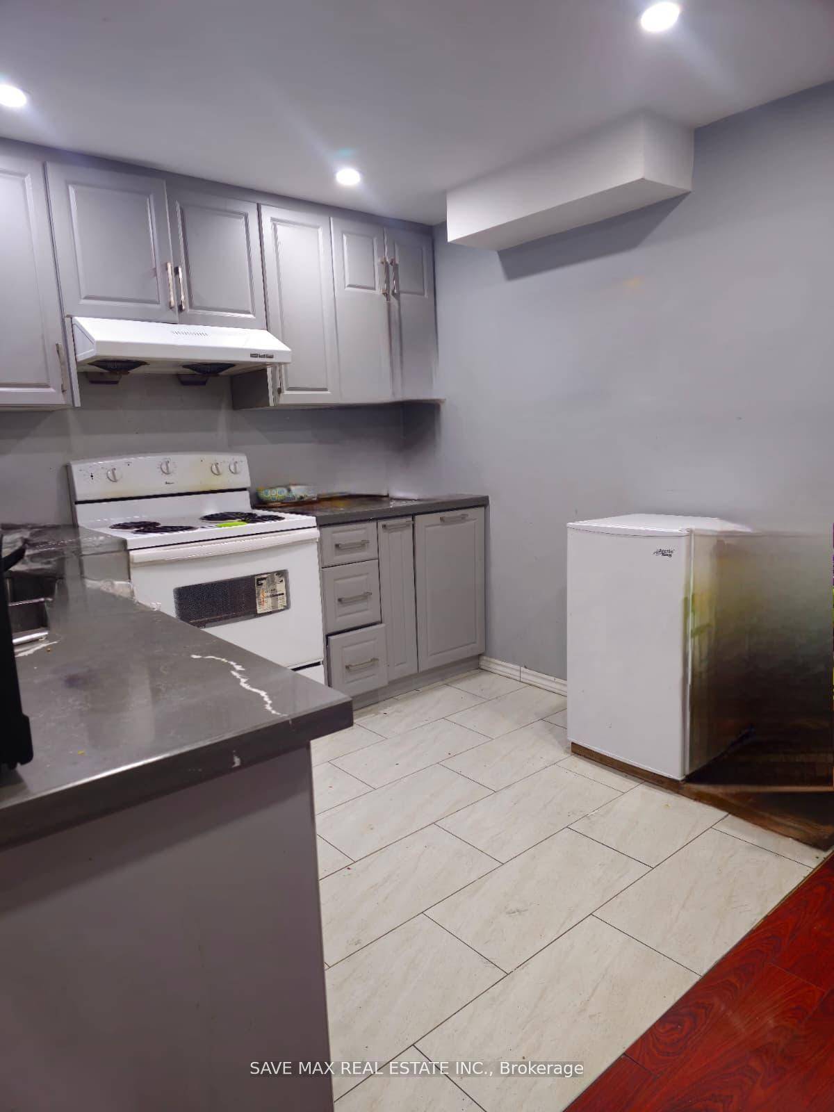 Spacious basement apartment with separate entrance for lease, featuring 2 bedrooms, 1 bathroom, and 2 parking spot.