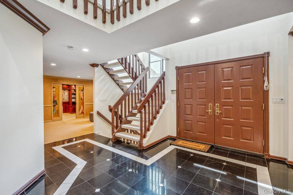 Nestled in a quite cul de sac, sits this Darby Model boosting four Bedrooms and Baths with a fully finished lower level and a main floor in laws suite.