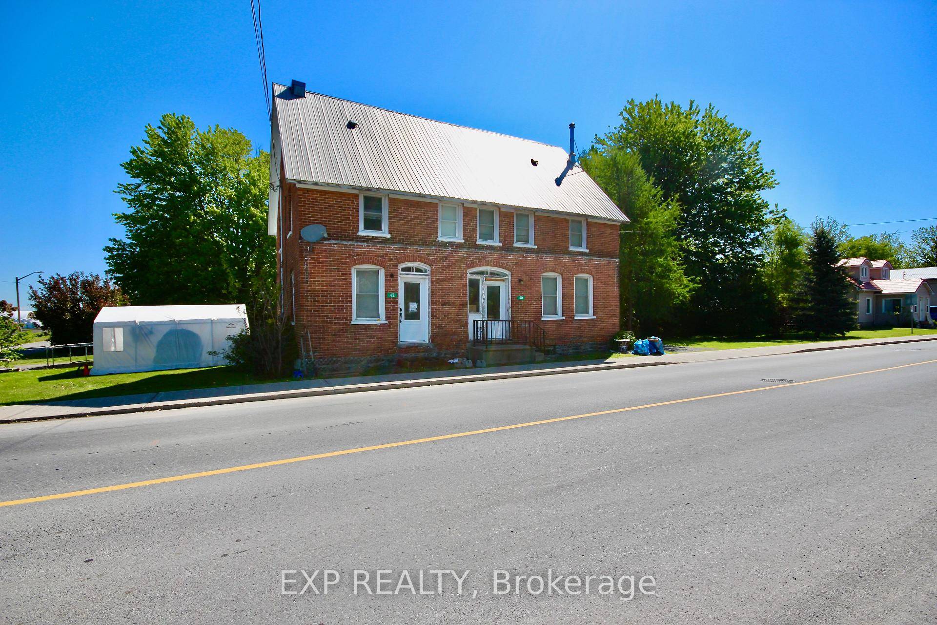 Welcome to 40 amp ; 42 Main Street, Finch, a rare find offering two spacious 3 bedroom units in a beautifully updated century duplex.