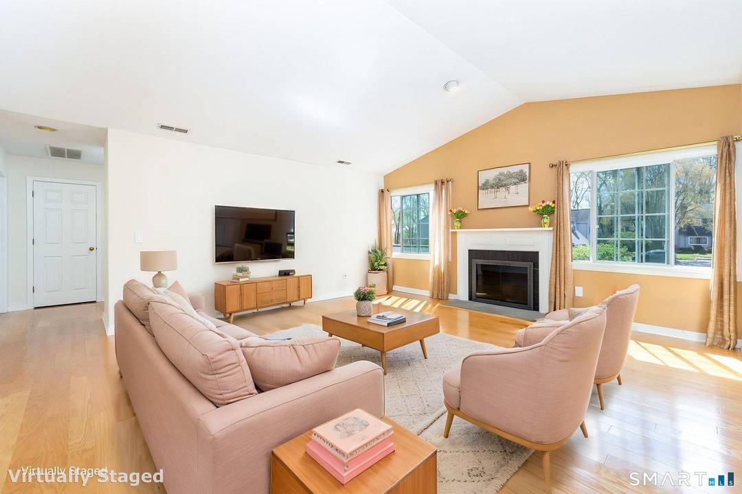 Welcome home to this bright and inviting 2 bedroom, 2 bath ranch style condo in sought after Woodfield Village.