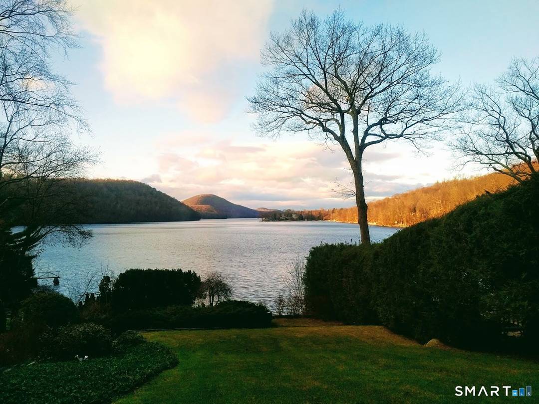 Welcome to this gorgeous Chimney Point Cove waterfront in the sought after Candlewood Lake Club.