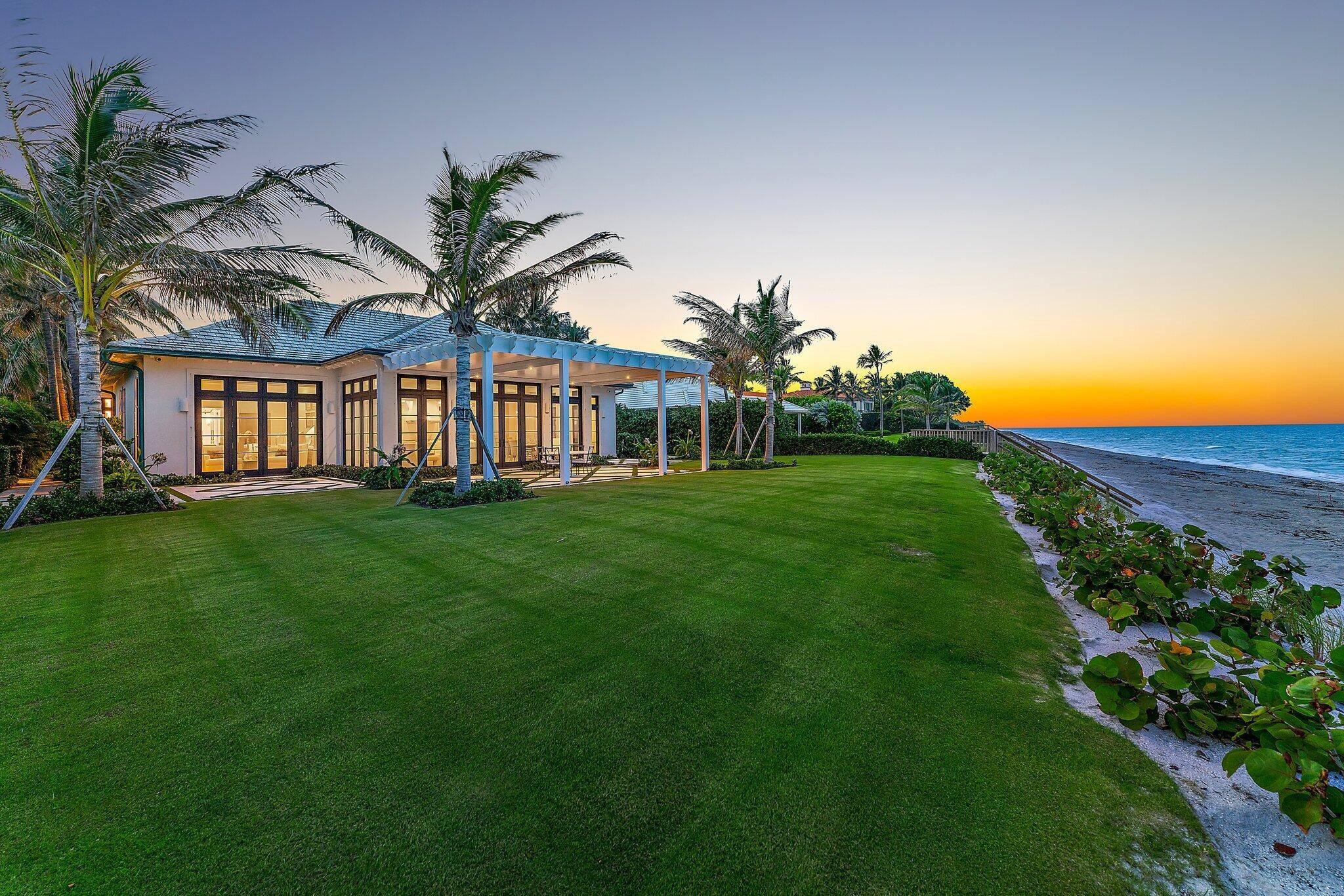 This oceanfront home in Lost Tree Village, just meticulously reimagined with no expense spared, offers unparalleled luxury.