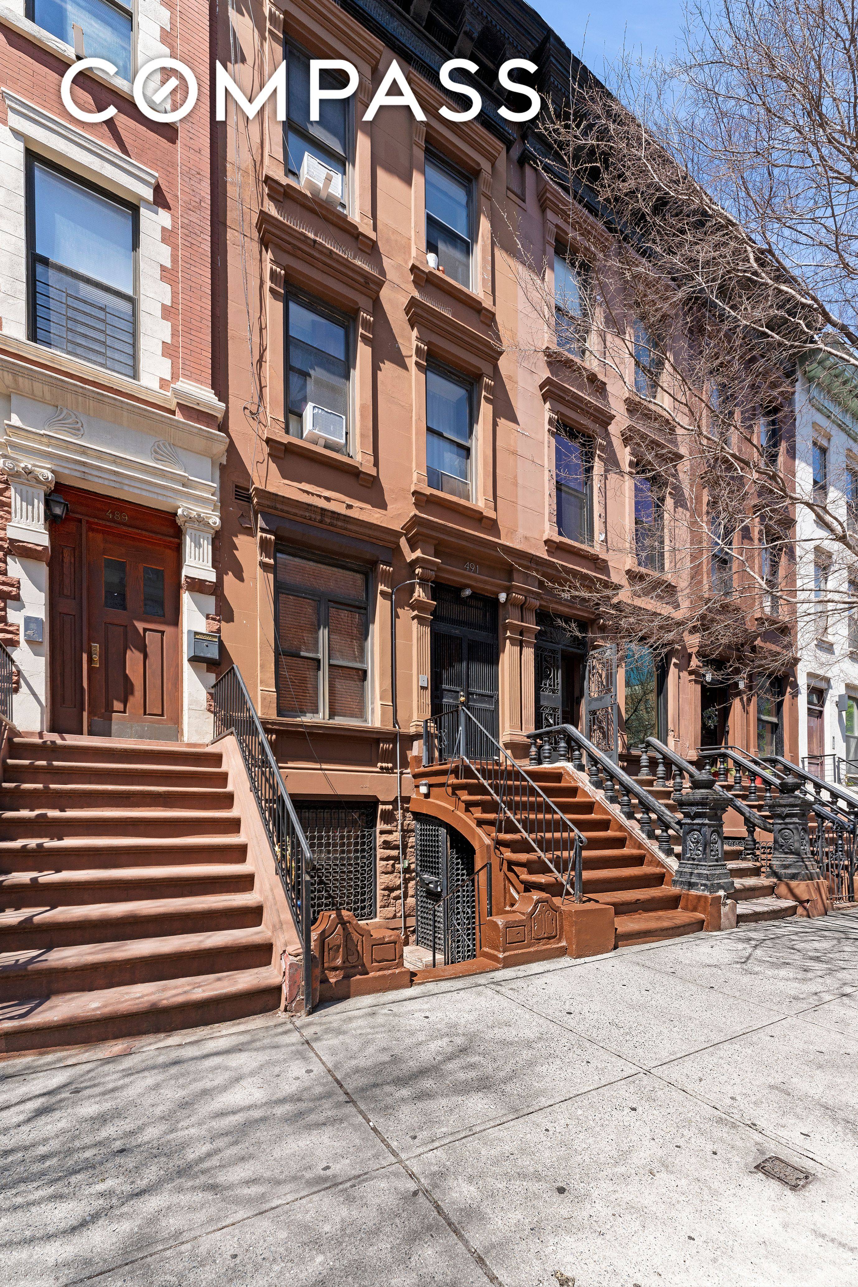 491 Manhattan Avenue is a 3 story apartment building located on a tree lined street in South Harlem.
