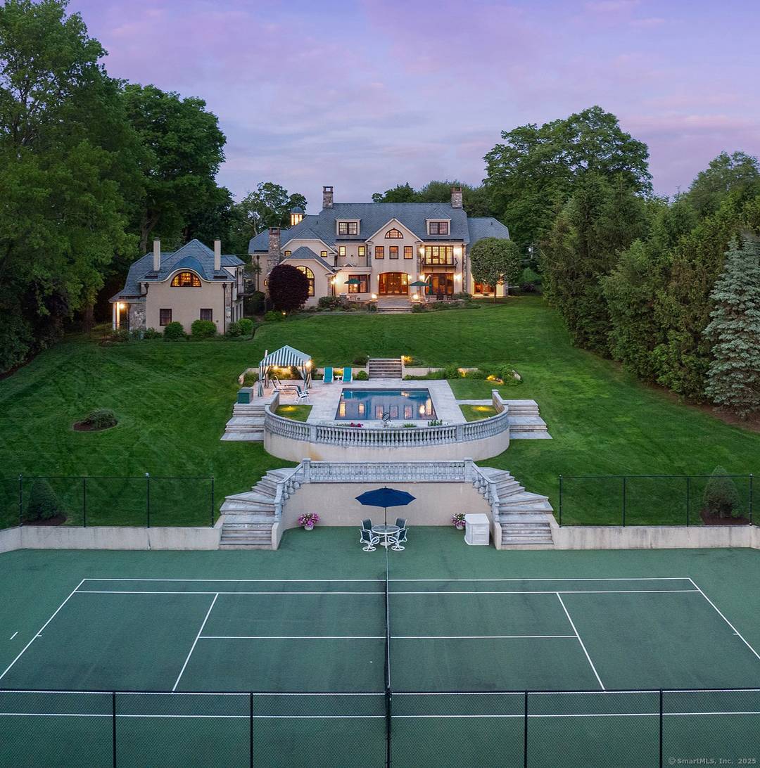 61 High Ridge Ave, a regal estate nestled in the heart of Ridgefield, CT's Historic District, with walking distance to downtown.