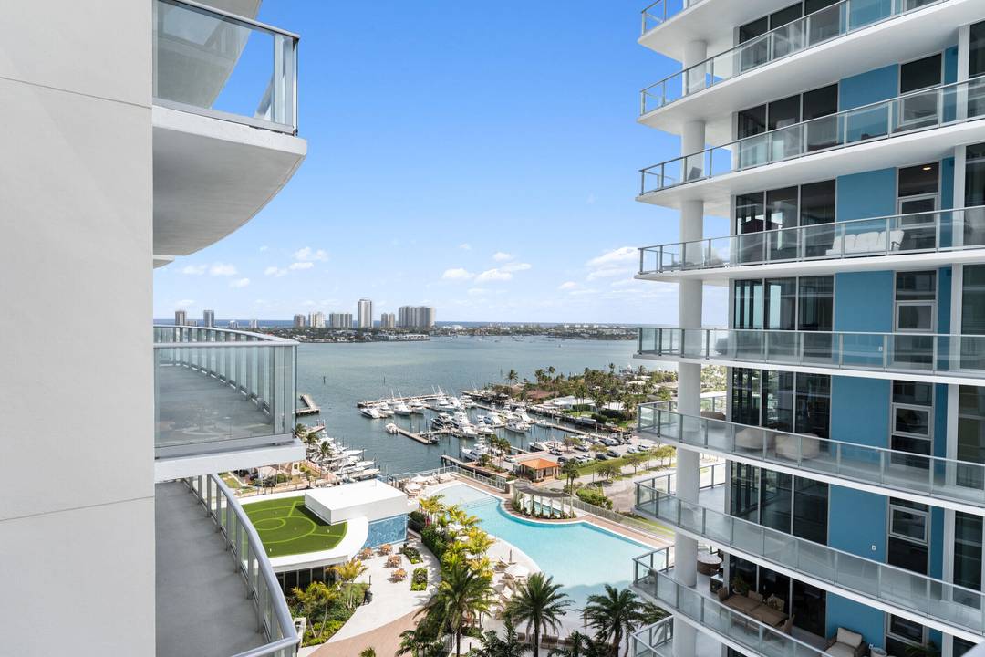 Rare Floorplan C residence at Nautilus 220 featuring expansive wraparound balconies and sweeping water views.