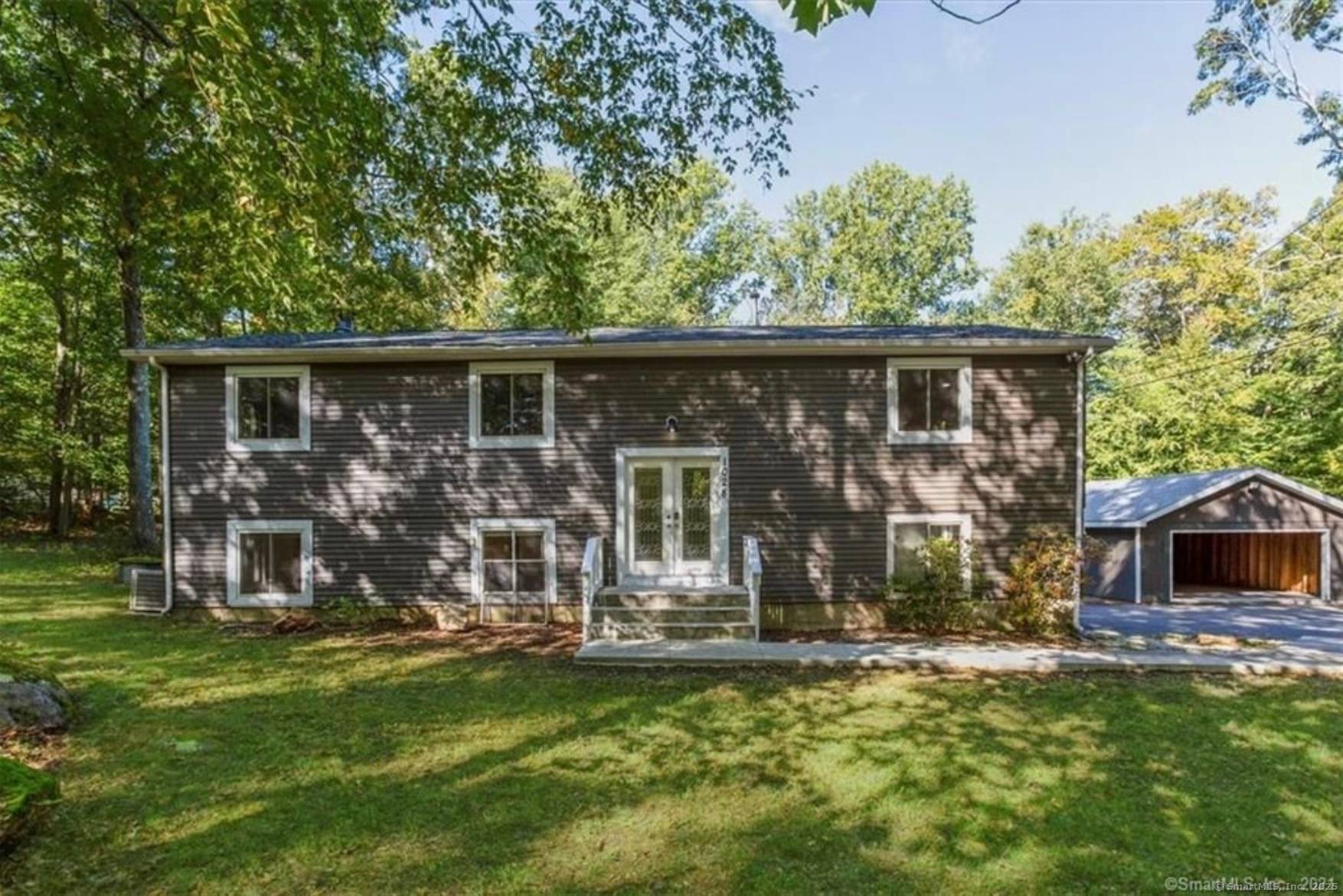 Turn Key 4 Bedroom, 3 Bath Home on a Private Lot in Guilford, CT Nestled on a scenic wooded country lane, this beautifully remodeled 4 bedroom, 3 bath home offers ...