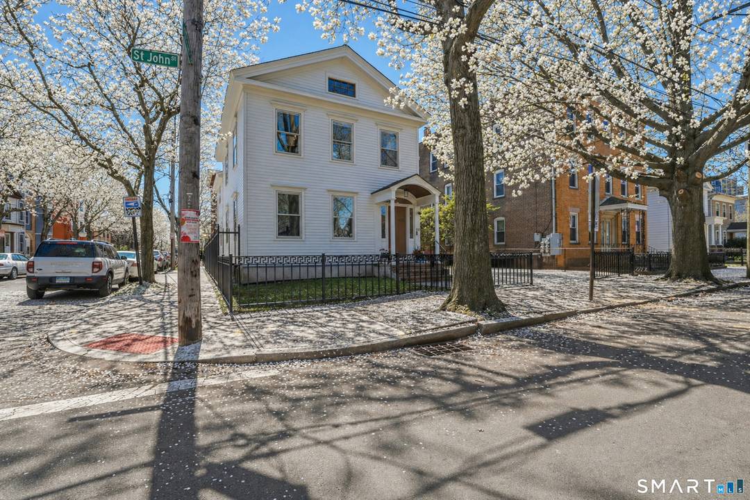 Wooster Square Showpiece Fully Renovated Inside Out Welcome to 216 Saint John Street, a completely restored antique Colonial set on a prime corner lot in the heart of Wooster Square.