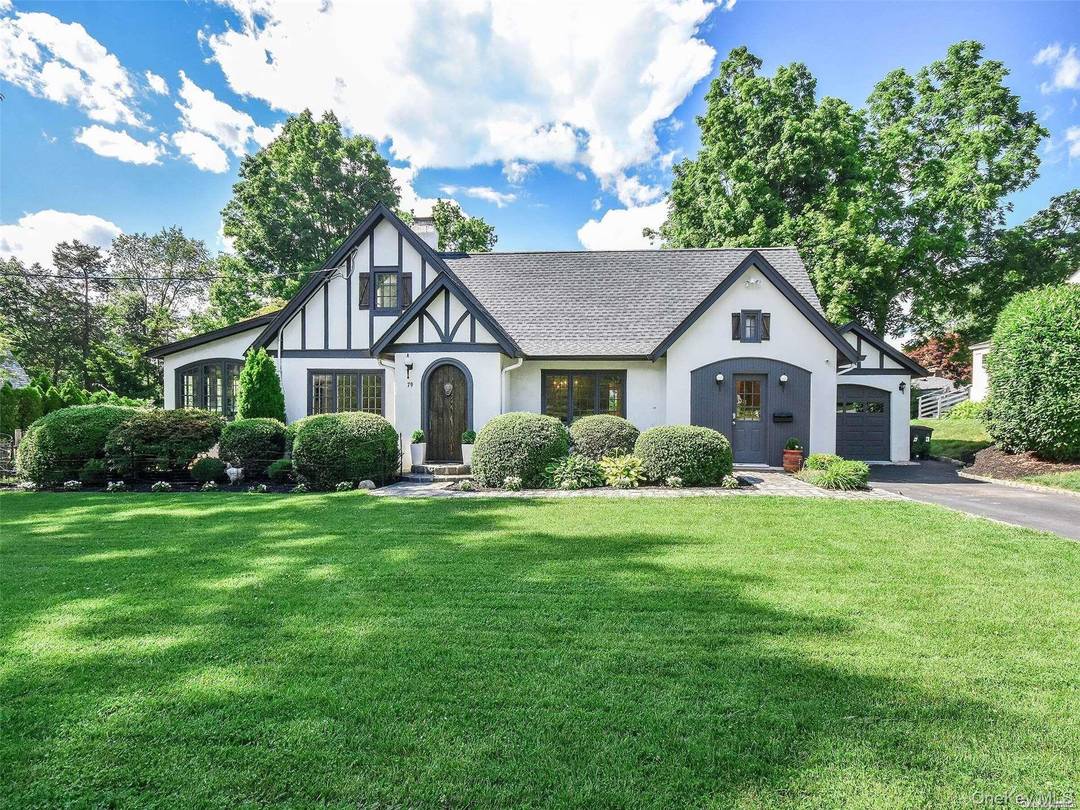 Step into this STYLISHLY UPDATED, Fully Furnished, TUDOR that blends modern desige with a touch of OLD WORLD Charm.