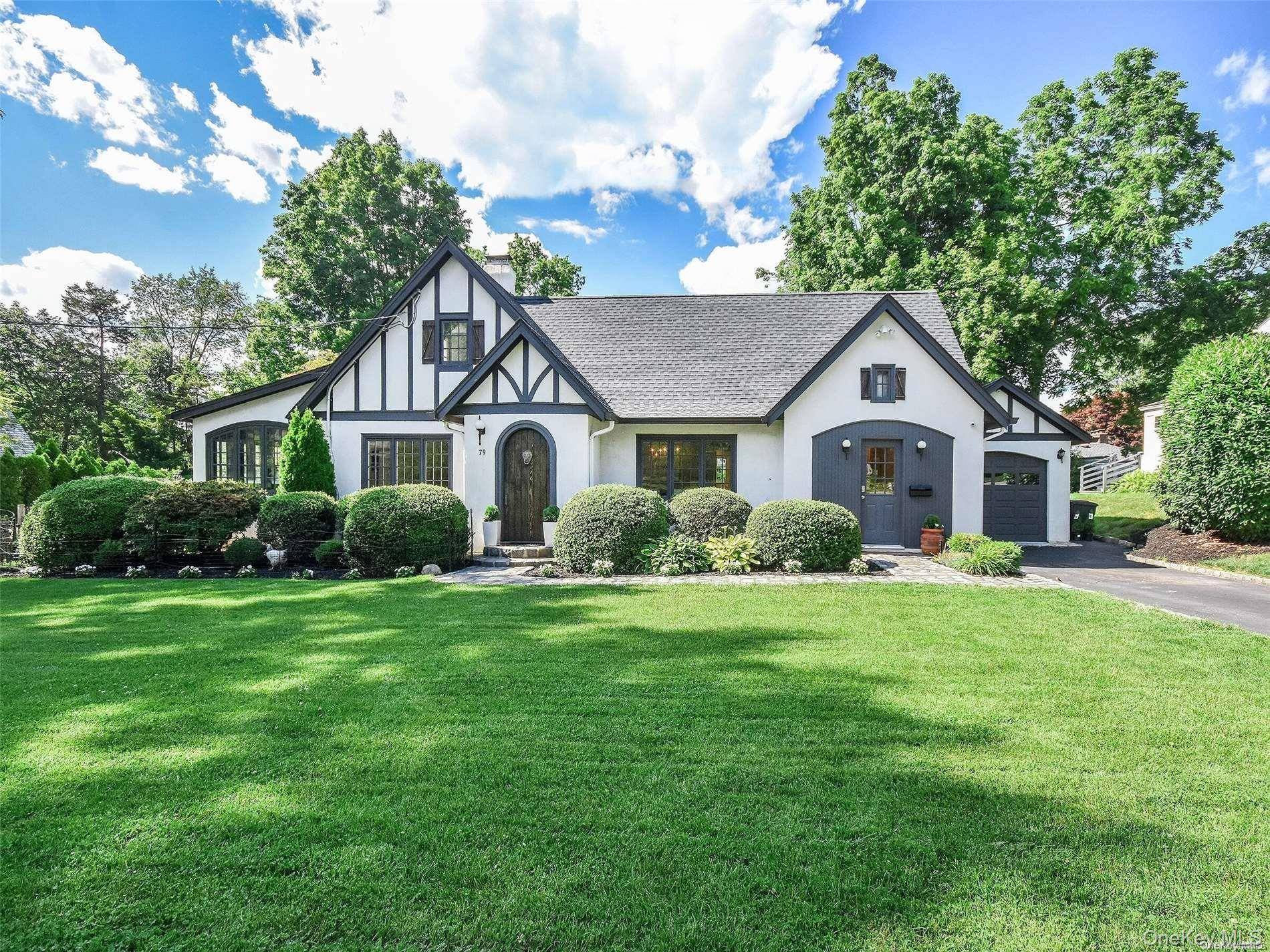 Step into this STYLISHLY UPDATED, Fully Furnished, TUDOR that blends modern desige with a touch of OLD WORLD Charm.