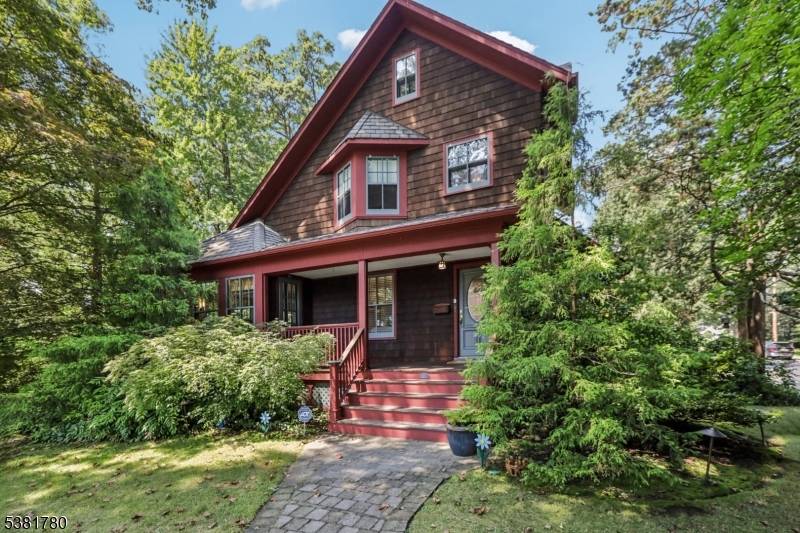 For those dreaming of a life that blends beauty, creativity, and convenience, this enchanting cedar shake saltbox in Oradell's coveted Latchstring neighborhood is a rare find.