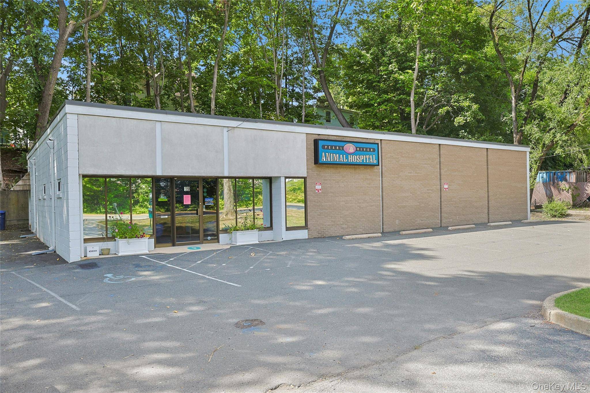PEARL RIVER PROFESSIONAL BUILDING Rare chance to own a freestanding commercial building in the heart of Pearl River with prime visibility and unbeatable convenience.