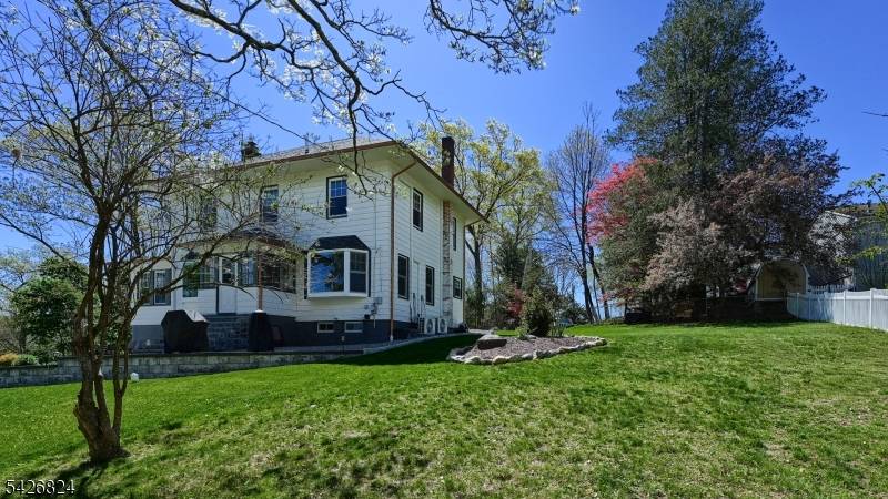 1900's Charm and soaring ceilings completed with all modern upgrades and views for miles from every level.