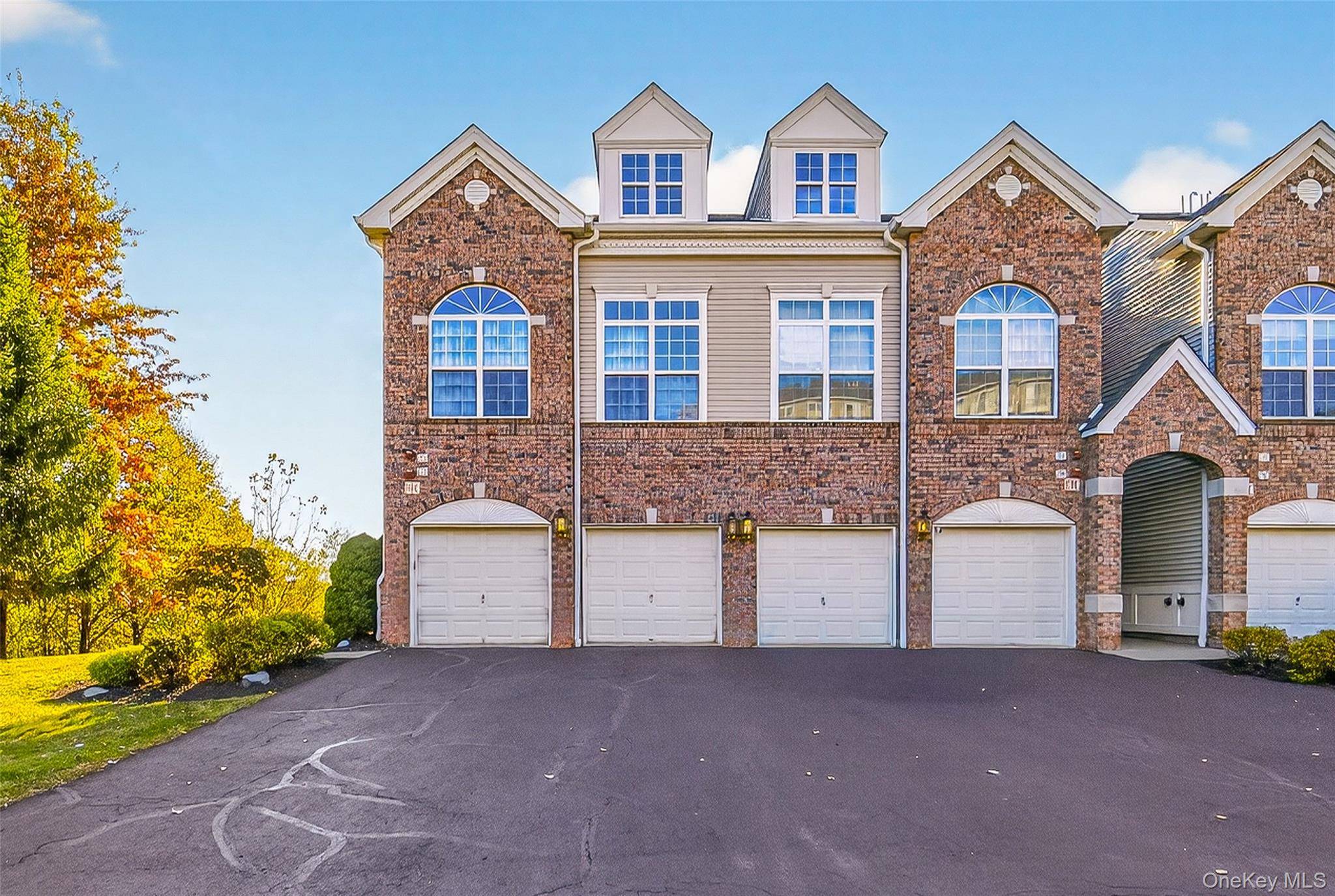 Welcome to 1313 Balsam Drive, a beautifully maintained end unit 2 bedroom, 3 full bath condo in the highly desirable Grove community of New Windsor.