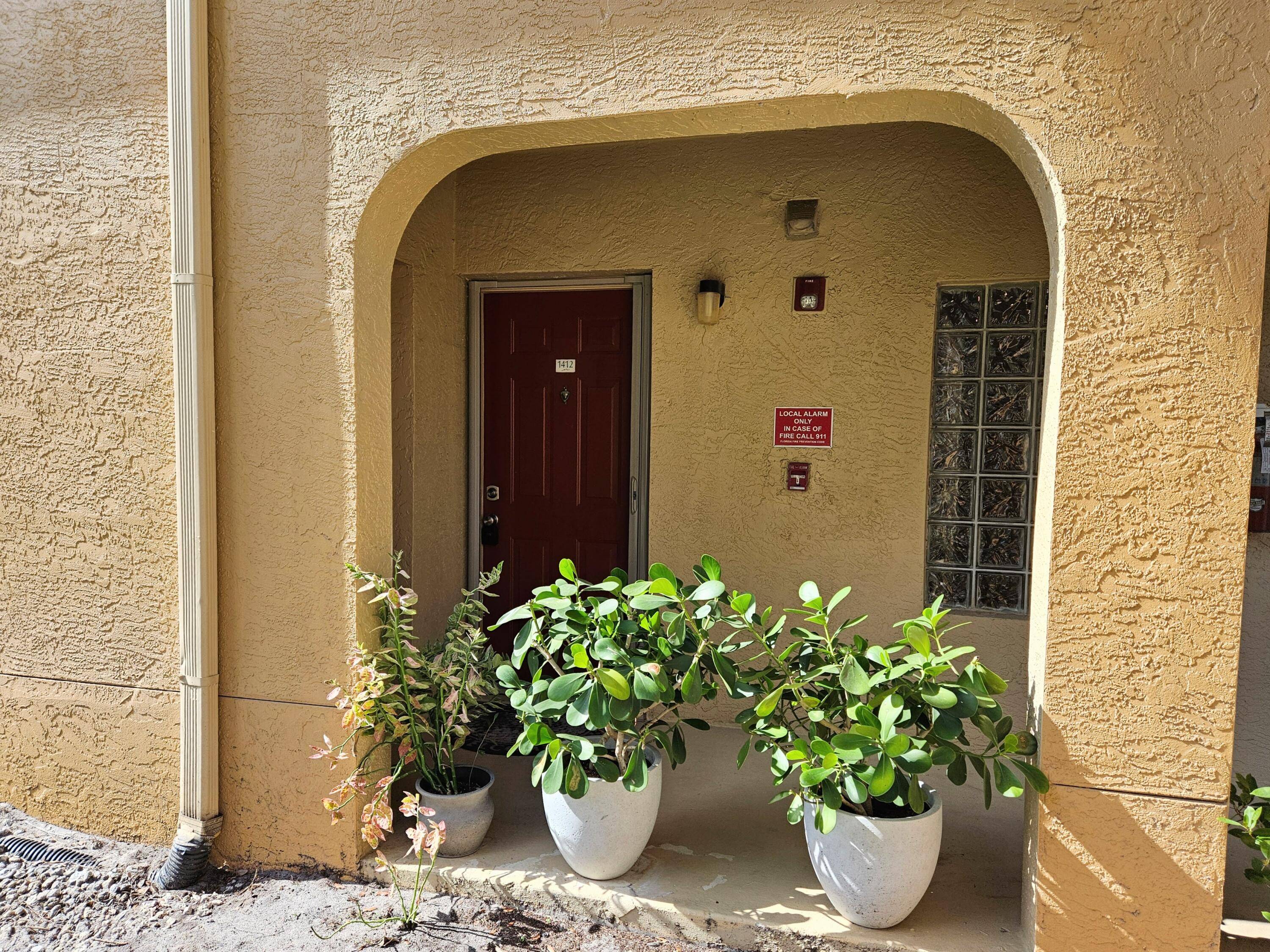 Charming and spacious updated 1st floor 2 2 condo with screened patio and extra storage in all ages gated community.