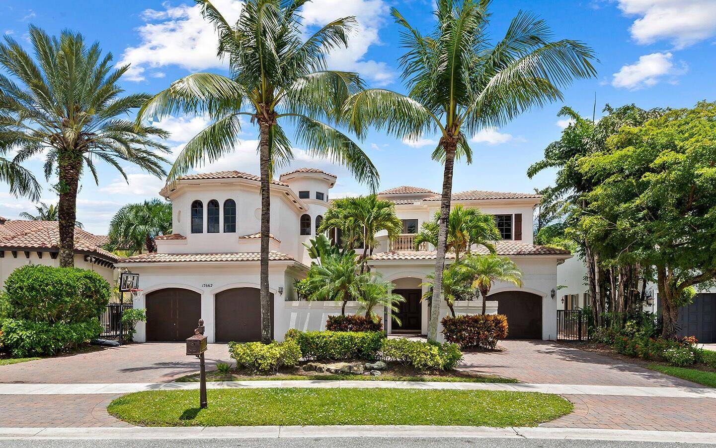 Experience luxury in this remodeled lakefront estate featuring 6 bedrooms, 7 bathrooms, a home office, and a media theater room.
