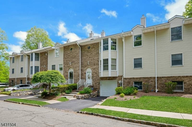 Three story contemporary townhome Large Bay windows with lots of light.