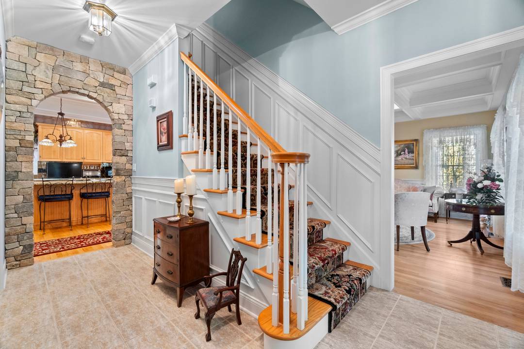 Welcome to an extraordinary approx 5, 600 sq foot custom built Colonial, privately sited on a beautifully manicured parcel that offers both elegance and seclusion.