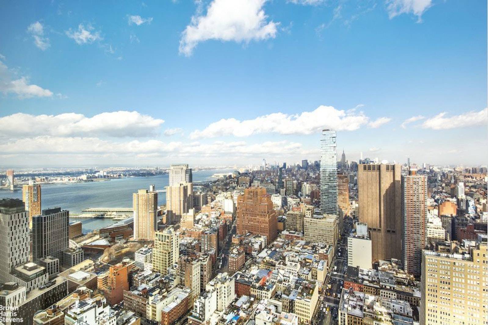 Apartment 58B presides majestically above the Tribeca Historic District, with sensational views to the Hudson and East Rivers, as well as the Midtown skyline and Brooklyn.