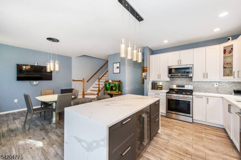 Welcome to 10 Gannet Court an exceptional end unit in the sought after Stonebridge community, offering rare upgrades and true turnkey living.