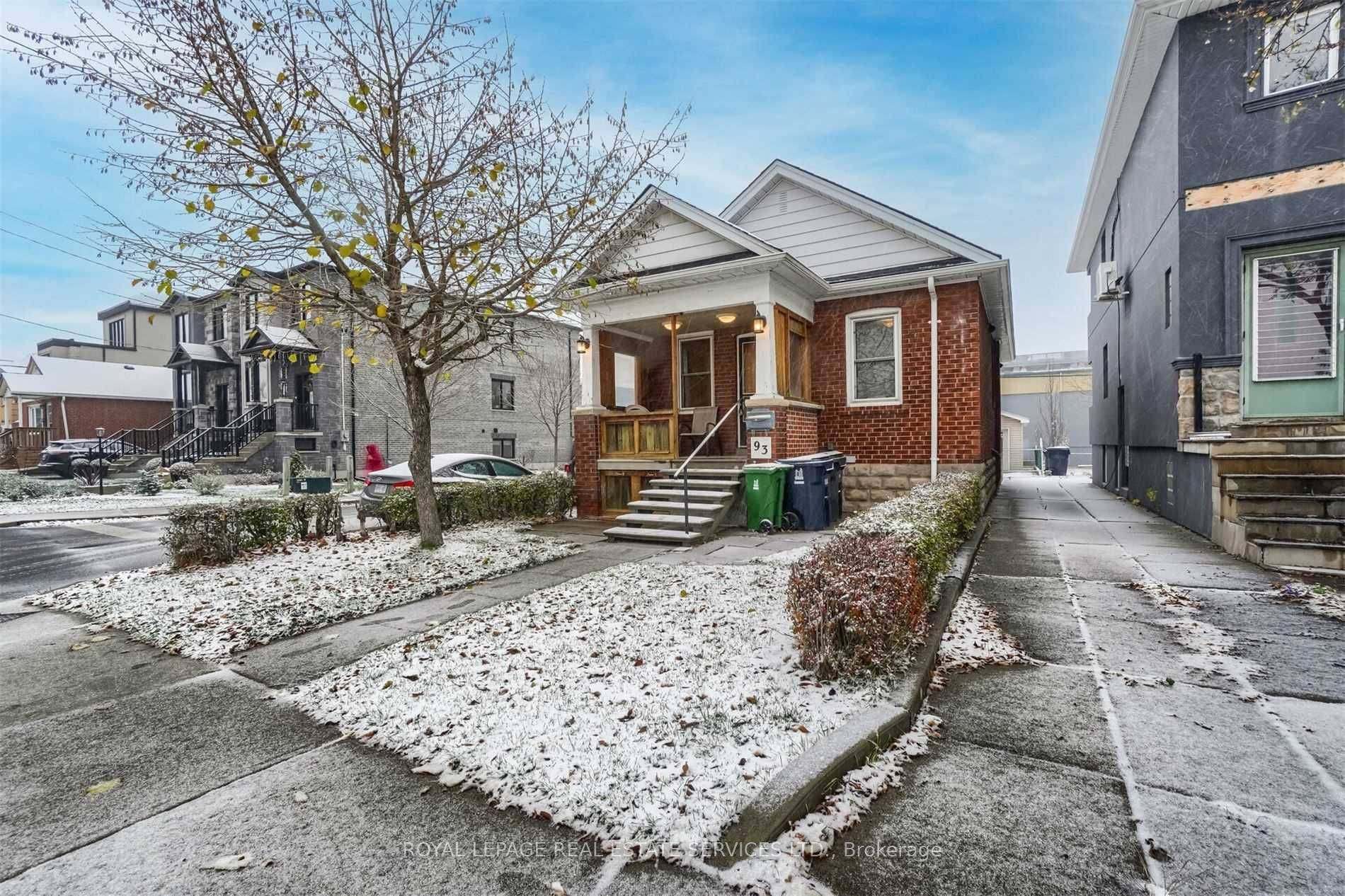 This basement apartment welcomes you with a cozy ambiance as you descend the stairs.