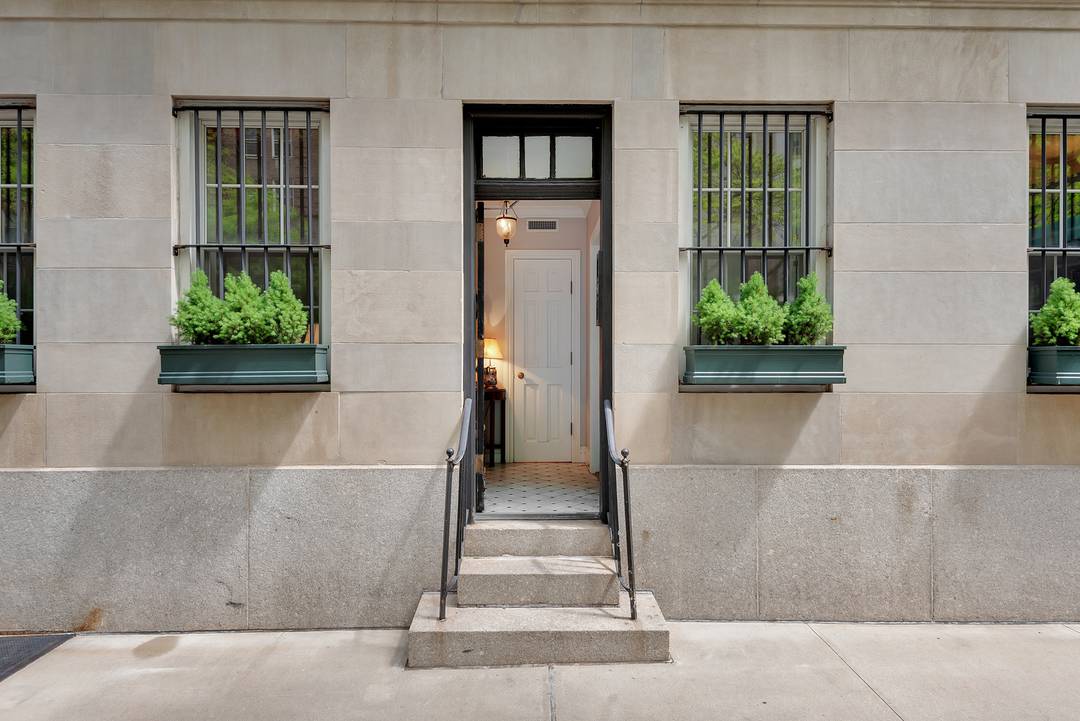Nestled in the heart of Carnegie Hill, this rare ground floor apartment offers the timeless elegance and comfort of a private townhouse within a full service cooperative.