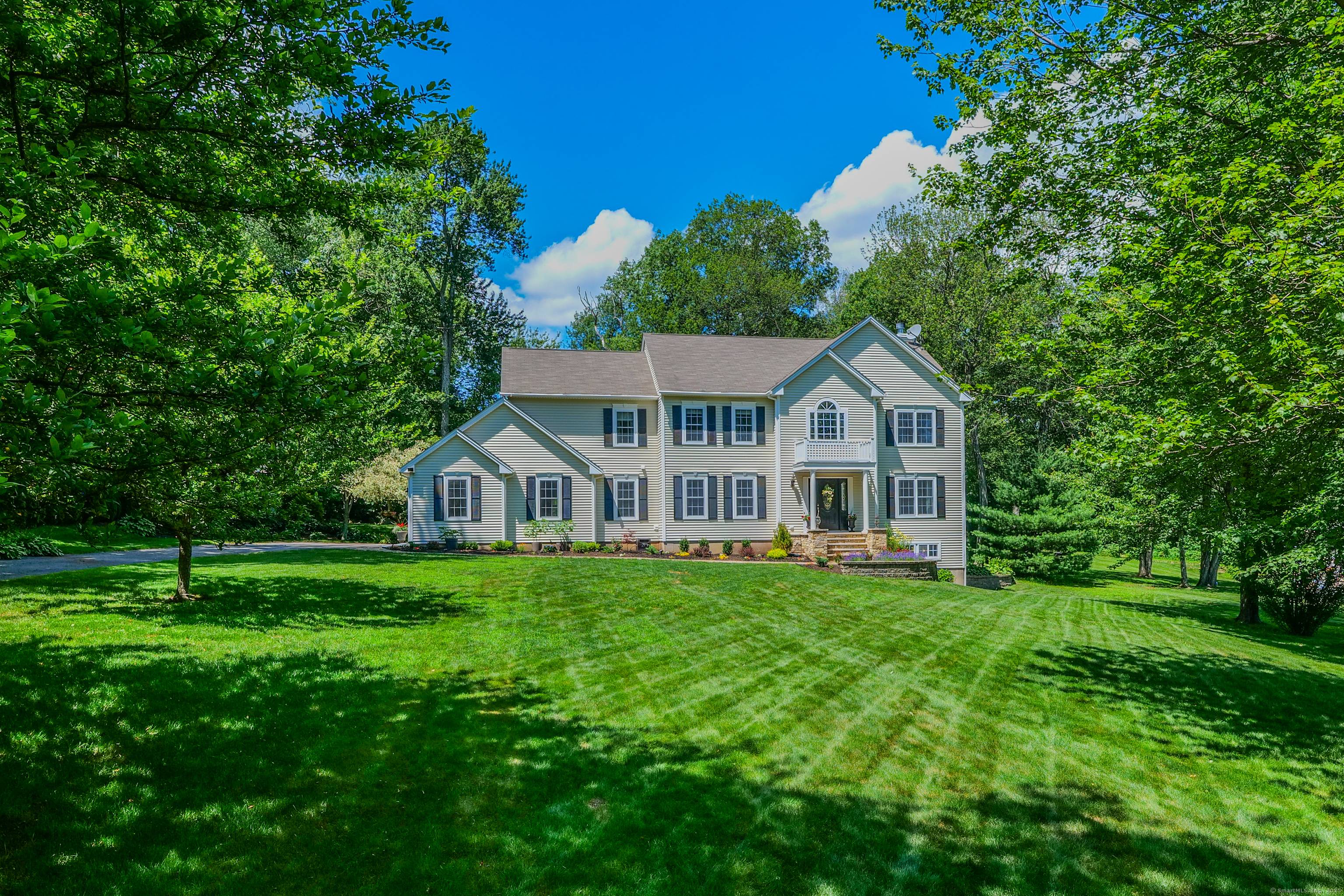 Welcome to this beautiful and meticulously updated conventional colonial, offering a perfect blend of timeless charm and modern comfort.