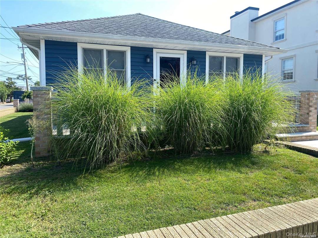 Beautiful updated home in a private beach and bay community, with stainless steel appliances new floors.