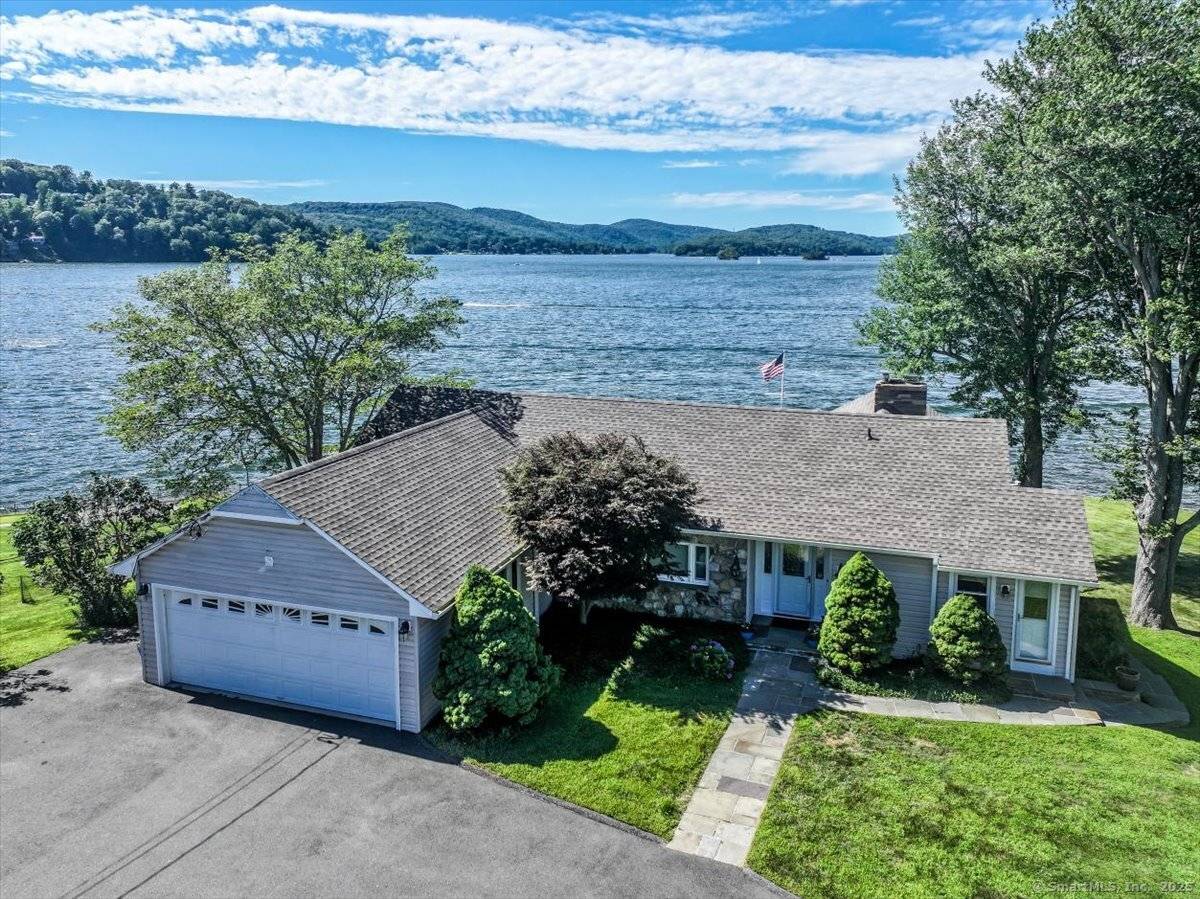 Don't miss this rare opportunity for one of the most picturesque waterfront locations on Candlewood Lake !